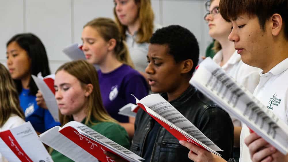 Choir rehearsal before the fine arts concert at Ontario Christian High School