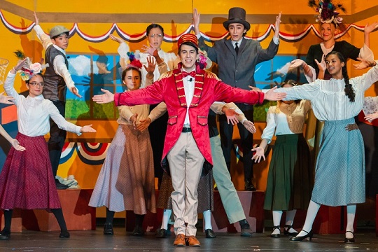 Middle School and High School Students on Stage Performing the Music Man Jr.