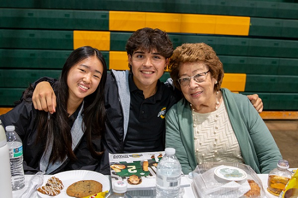 Male and female student with their grand mother at the 2023 High School Grandparents Day.