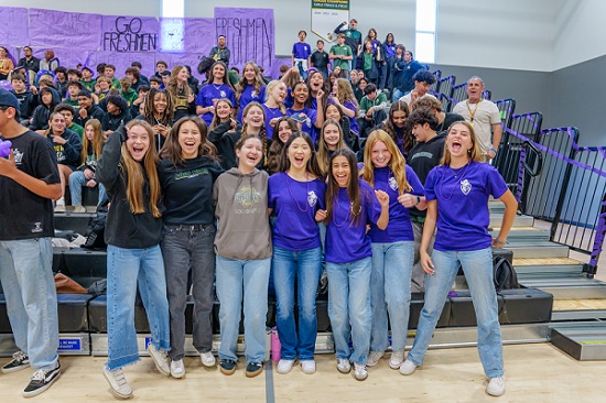 High school group of freshman girls cheering during High School March Madness Week