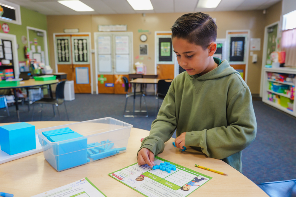 StudentWorkingOnMathProblemInTheLearningCenter